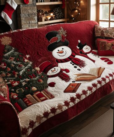 Reading In The Snow Quilted Sofa Cover