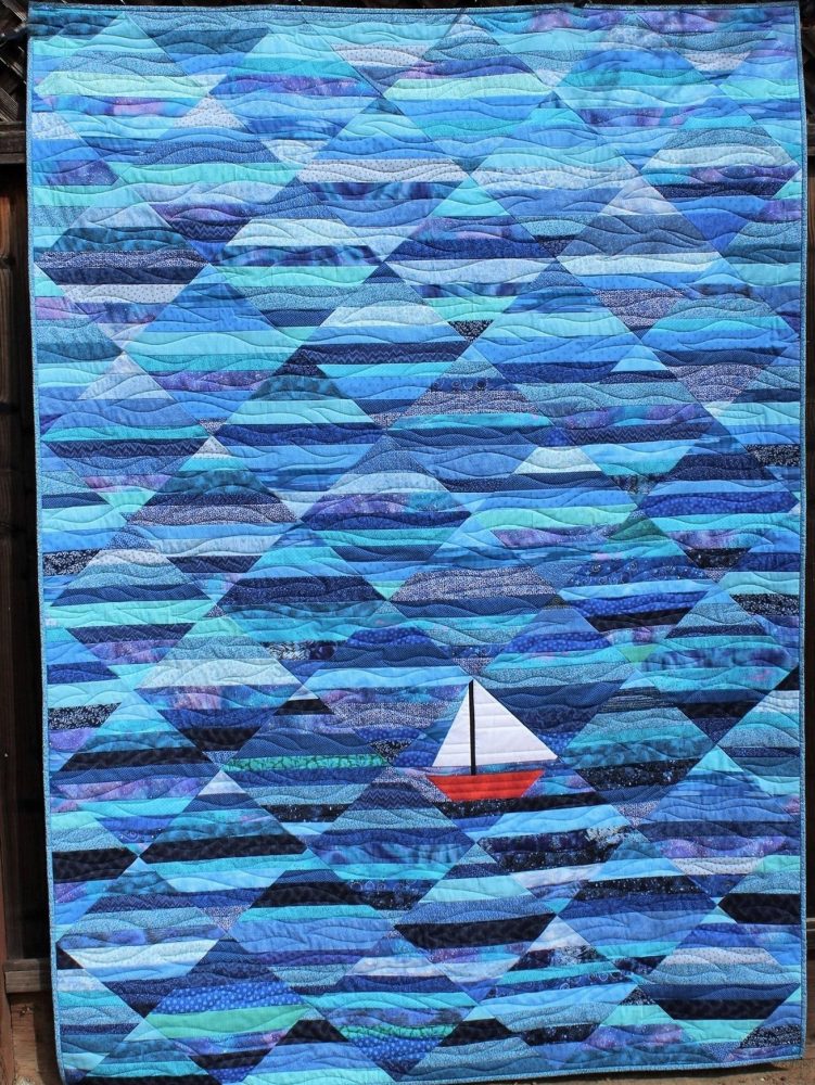 Red Boat Blue Sea Quilted Blanket